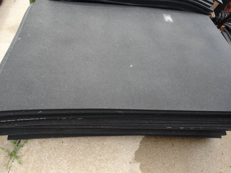 lot 16136 image: Large lot of rubber mats, most have holes or are cut.