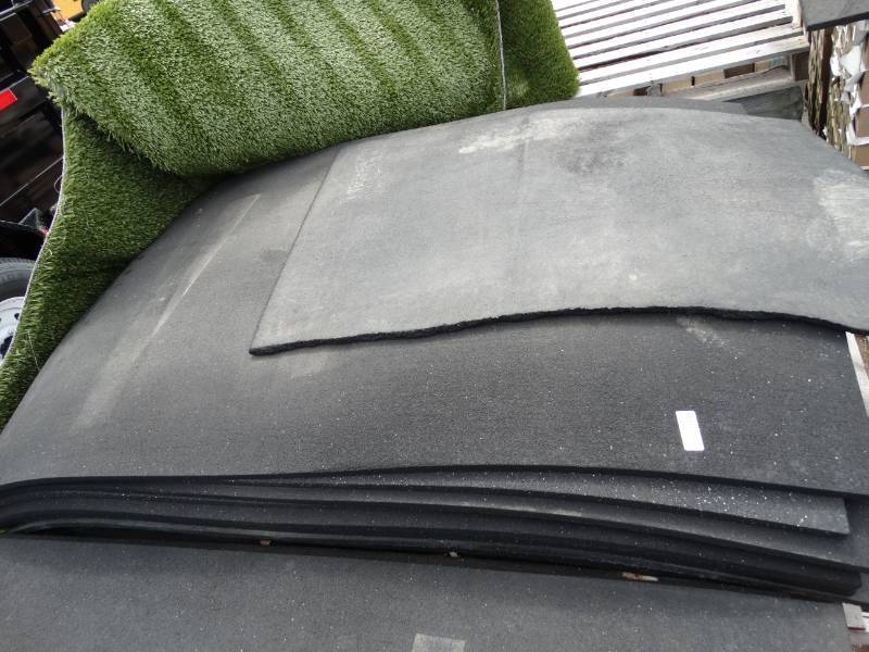 lot 16137 image: Large lot of rubber mats, most have holes or are cut.