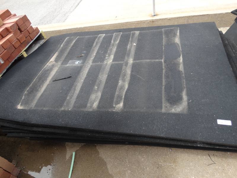 lot 16139 image: Large lot of rubber mats, most have holes or are cut.