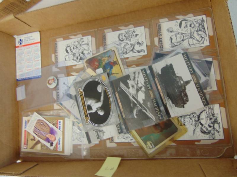 lot 7068 image: Miscellaneous cards - Desert Storm, Supermen, Military Machines, Pat Brady pinback