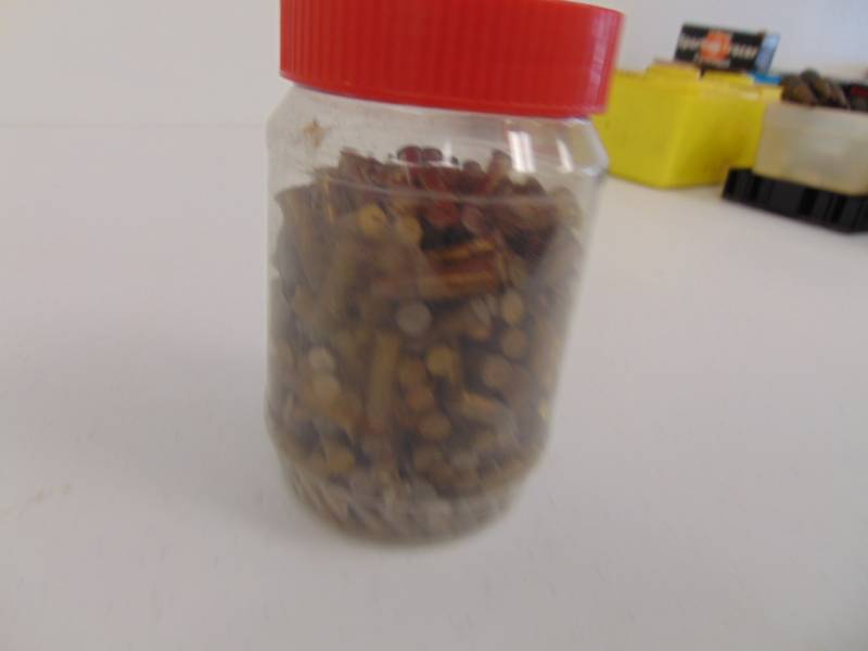lot 7112 image: Small Jar of unknown MFG 22 Shells