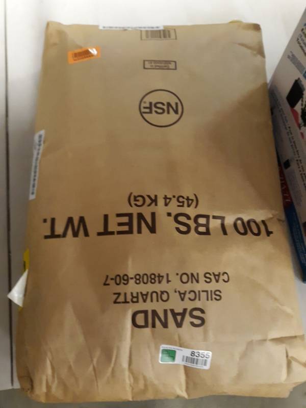 lot 8355 image: 100 pounds worth of sand