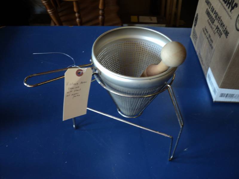 lot 7986 image: Vintage metal Strainer with stand and pestle