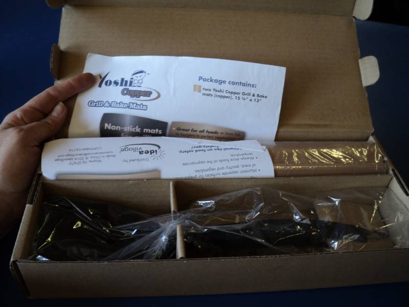 lot 8010 image: Yoshi Copper Grill and Bake Mats w spatula