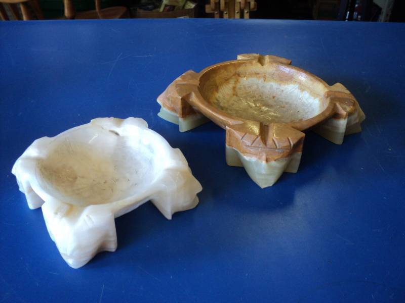 lot 8013 image: (2) ct lot Alabaster Marble() Pharoah feet Ashtrays, (1) White 6 x 6 x 2, (1) Brown 8 x 8 x 2