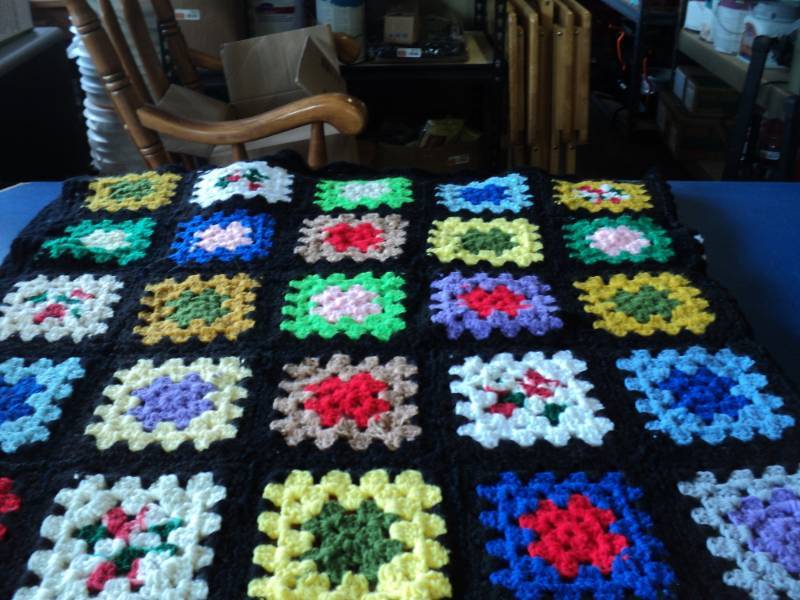 lot 8076 image: Handmade Granny Square Afghan, black border, 60 x 6