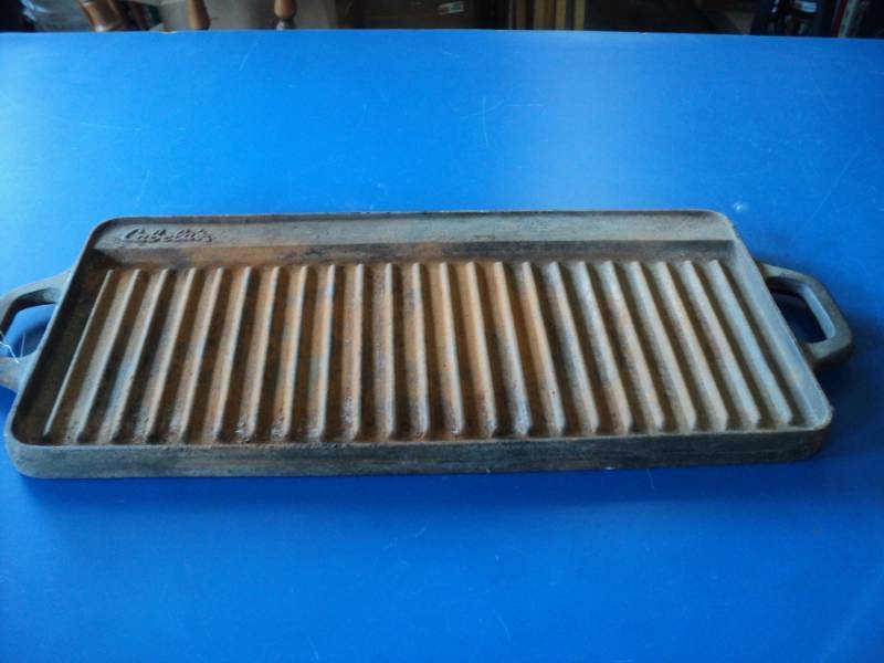lot 8081 image: Cabelas Cast Iron Griddle Grill, 10 x 24 (including handles)