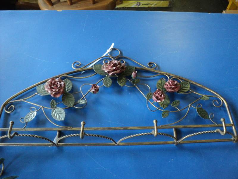 lot 8083 image: (4) piece set decorative metal rose taper candle holders and hooks