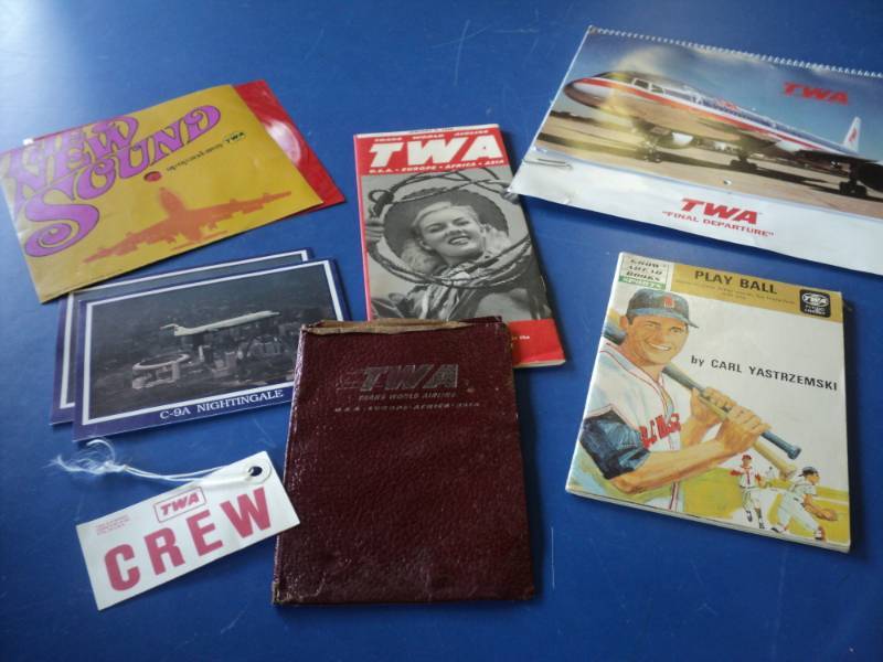 lot 8088 image: (8) ct mixed lot TWA Memorabilia, Calendar, record, books and more