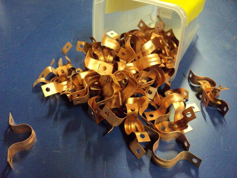 lot 8115 image: 1 lb copper colored straps, two sizes, 12 and 34