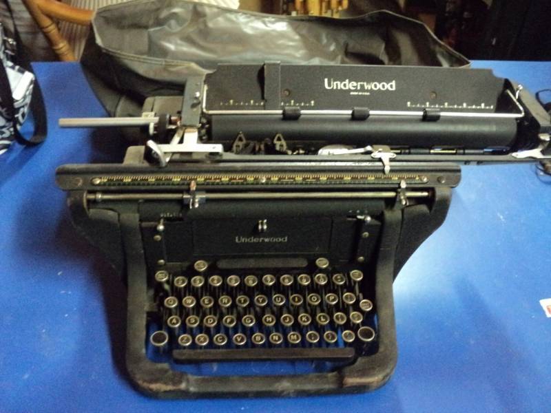 lot 8121 image: Antique Underwood Typewriter with plastic dust jacket