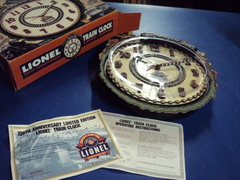 lot 8132 image: Lionel 100th Anniverain Clock 1900-2000, certificate of authenticty included