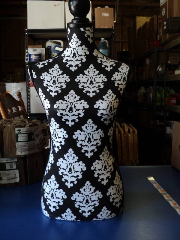 lot 8232 image: Female Mannequin Fabric Covered Torso, Black with White, approx 15 x 9 x 32 tall