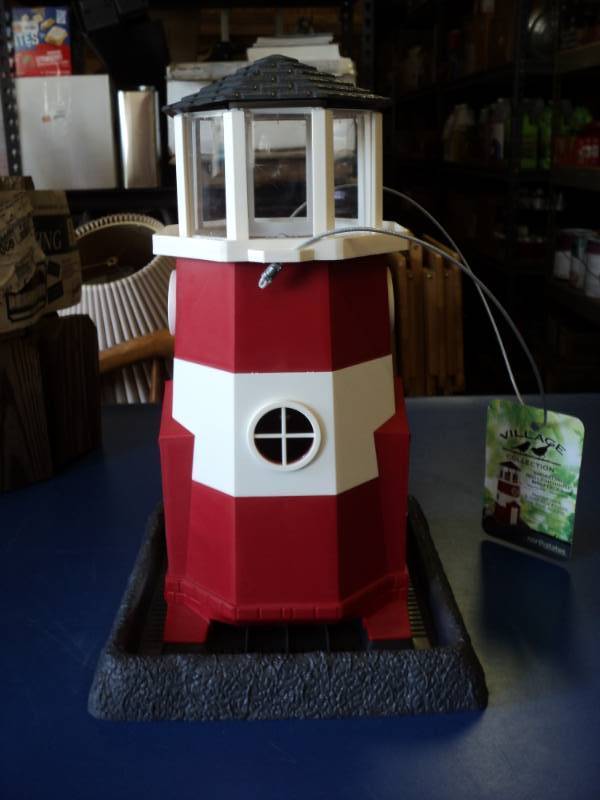 lot 8235 image: Village Collection Shoreline Red Lighthouse Bird Feeder, approx 9 x 10 x 15
