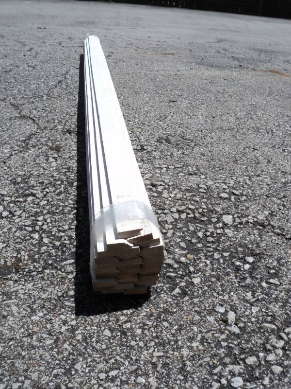 lot 8246 image: (1) Bundle of Milled, Primed Parting Stop, approx 1-14 x 38 x 81, (30) per bundle