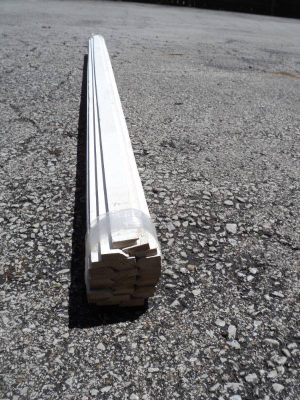 lot 8247 image: (1) Bundle of Milled, Primed Parting Stop, approx 1-14 x 38 x 81, (30) per bundle