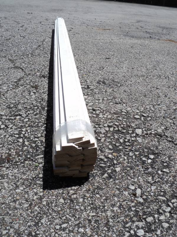lot 8248 image: (1) Bundle of Milled, Primed Parting Stop, approx 1-14 x 38 x 81, (30) per bundle