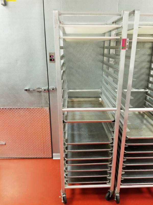 lot 9931 image: Rolling Racks with 8 Sheet Pans and 2 Cutting Boards