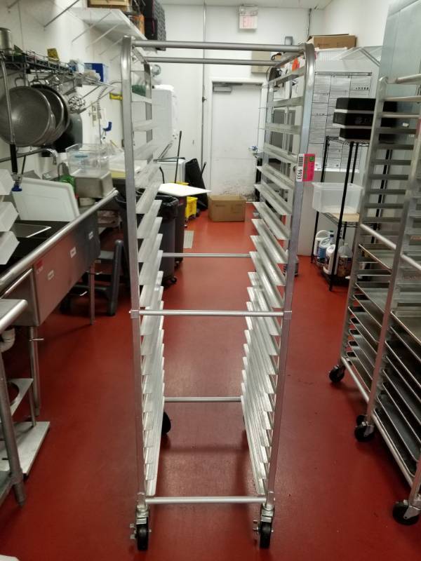 lot 9933 image: Rolling Sheet Pan Rack