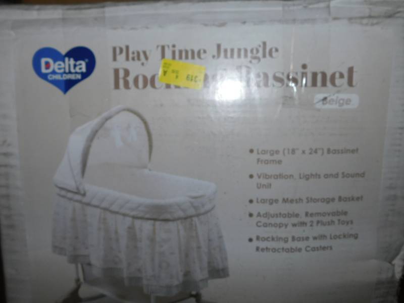 delta playtime jungle rocking bassinet