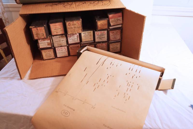 lot 1381 image: 18 Player Piano Song Rolls-in original boxes- Includes favorites like  In the Garden