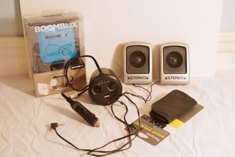lot 1391 image: Boombox-new in box -Turn virtually anything into a speaker -Memory Card Wallet -two speakers-Keep track of your memory cards 