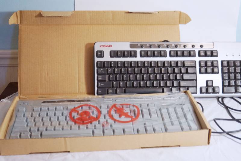 lot 1393 image: Two Keyboards- HP is new in package -lots of options-The Compaq is unknown working condition.