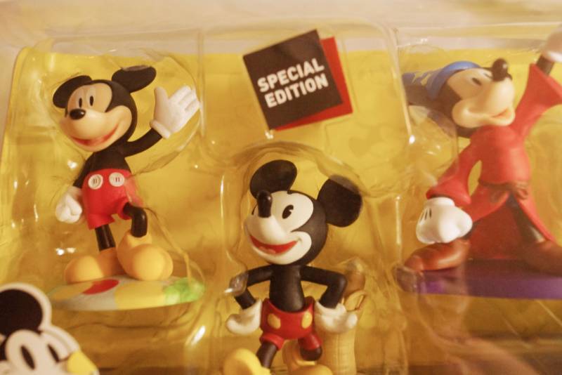 lot 1413 image: Mickey Mouse 90 Years Plastic Collectible Figurine Set-Includes Steamboat Willie-Sorcerers Apprentice and more New in package Assorted Stress Balls