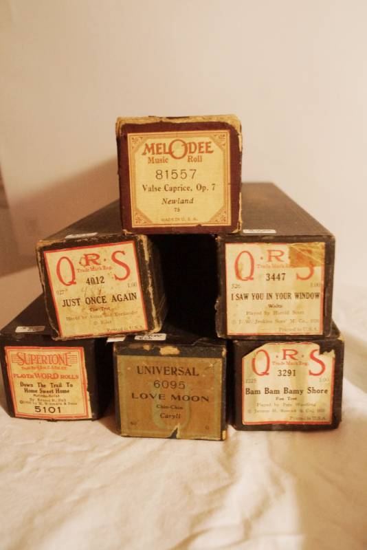 lot 1452 image: Player Piano rolls in original boxes-Lot of Six- see pics for song titles
