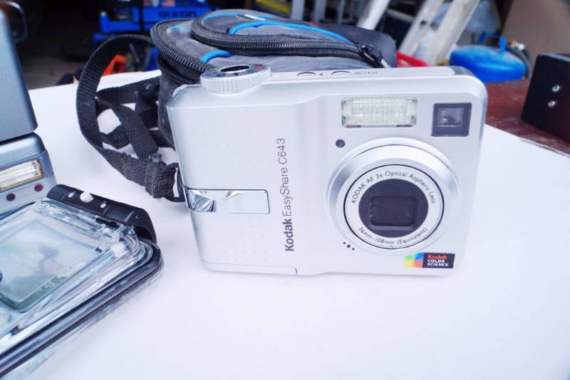 lot 1467 image: Kodak Easy Share Camera-Philips Digital Camera-Case Logic case-Clear H20 Audio case-See pics for more details