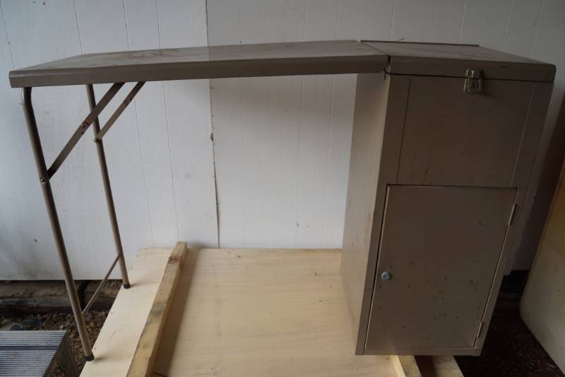 lot 1486 image: Metal File cabinet with fold out desk area- possibly Military-top opens for files- bottom is missing key