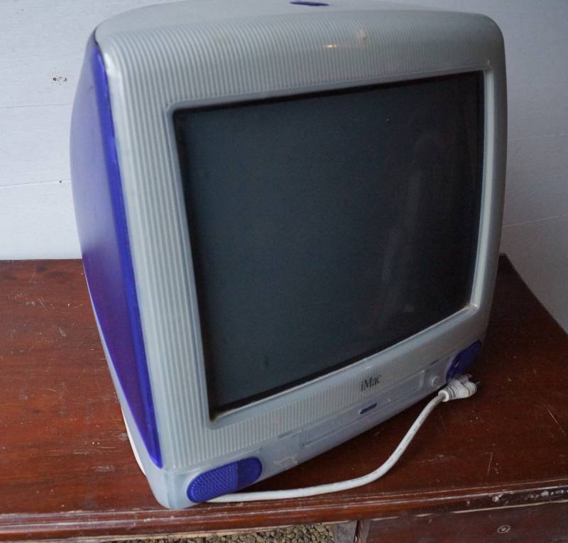 lot 1493 image: iMac Powermac Computer-Purple-Mac OS 86-powers on as it should-Unfortunately, we could not get a clear video or picture of it because computers dont photograph well. No lines on screen.