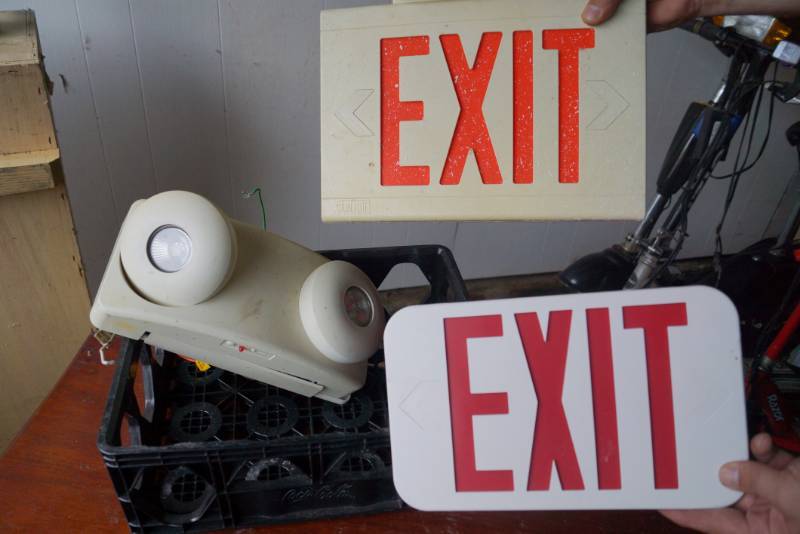 lot 1496 image: EXIT signs-Thomas and Betts Emergency lights-Black Plastic Coca Cola crate