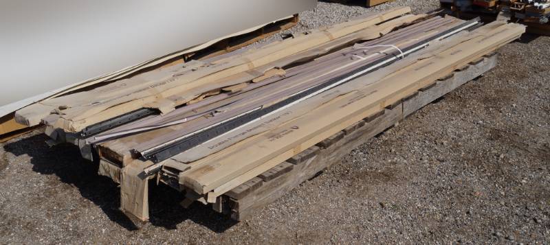 lot 5279 image: Pallet of Construction Items - Double Flange Sealant Backer (10), Wood Stakes, Rails and more- see pics