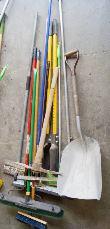 lot 5389 image: Lot of Long Handled Tools - Shovel, Pick Axe, Brooms, Rolling Magnet and More - see pics