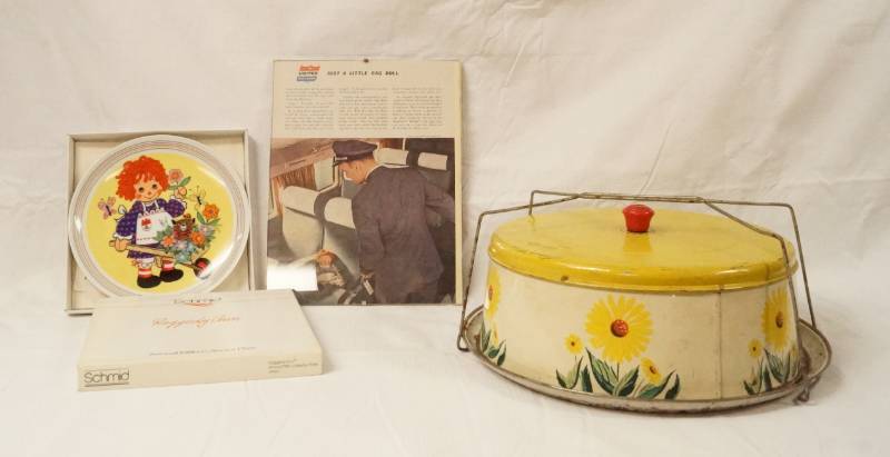 lot 5647 image: Lot of Vintage Items - Vintage Cake Holder - Raggedy Ann Plate - United Airlines Article Clip - Rare Items