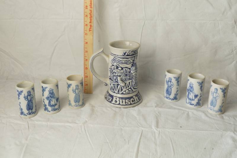 lot 1044 image: Lot of Ceremarte Shot Glasses and Busch Gardens Bud Mug