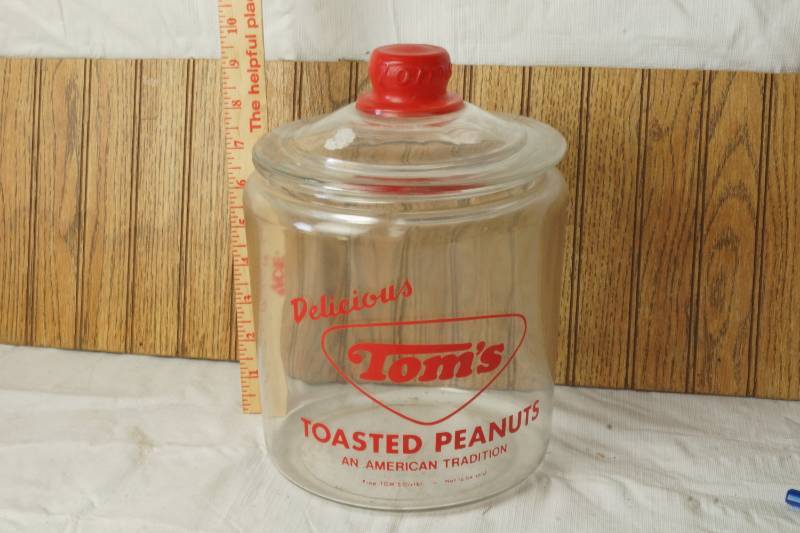 lot 1099 image: Vintage Toms Toasted Peanuts Glass Canister