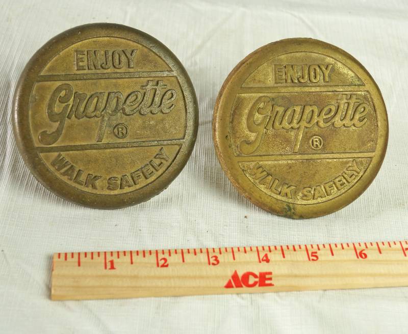 lot 1201 image: Lot of 2 OLD ENJOY GRAPETTE  WALK SAFELY CROSSWALK MARKER