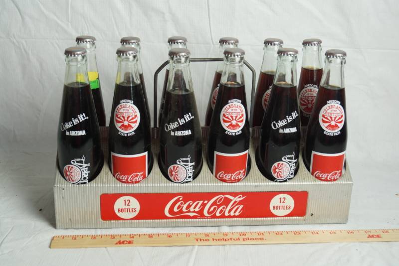 lot 1641 image: Coca-Cola ARIZONA STATE FAIR 1984 12 Sealed, Full Bottles and Metal Carry Case - Cool Item