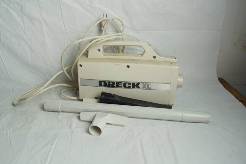 lot 1638 image: Handheld Oreck XL Vacuum - Works W Accessories