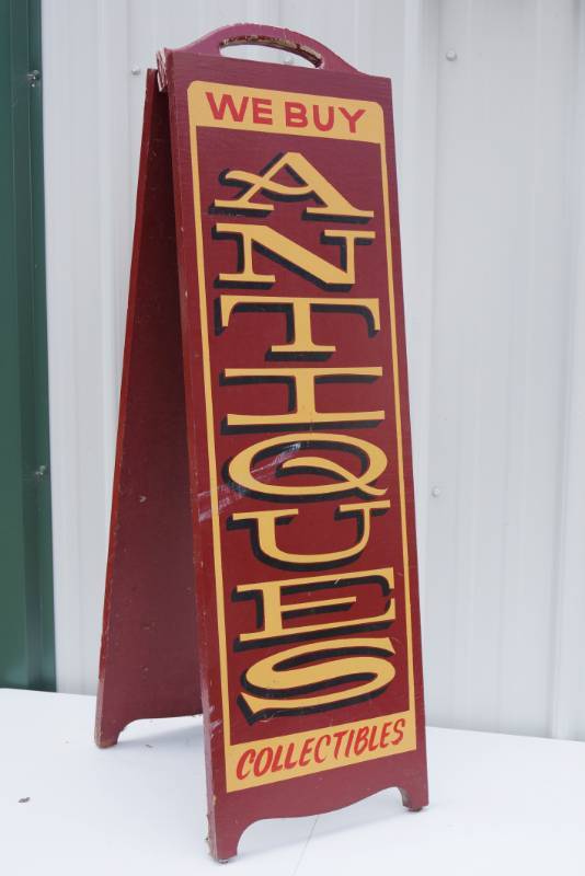 lot 1470 image: We Buy Antiques Wooden Sandwich Sidewalk Sign