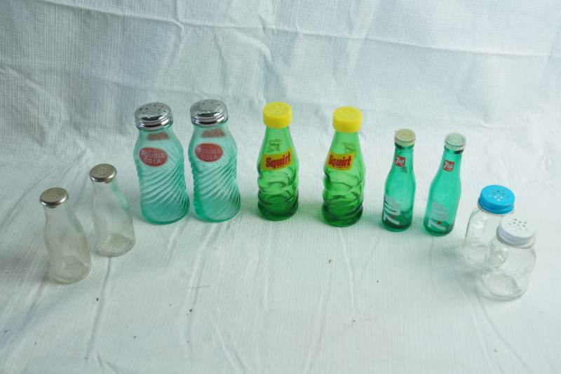 lot 1279 image: Lot of 5 Sets of Salt and Pepper Shakers - SQUIRT, 7-UP, DOUBLE COLA & MORE