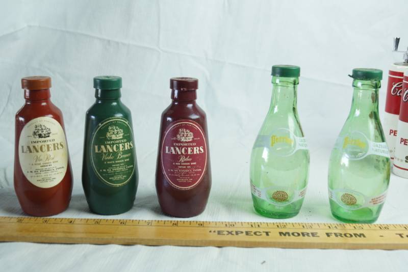 lot 1293 image: Lot of Vintage Salt and Pepper Shaker Set - Lancers and Perrier
