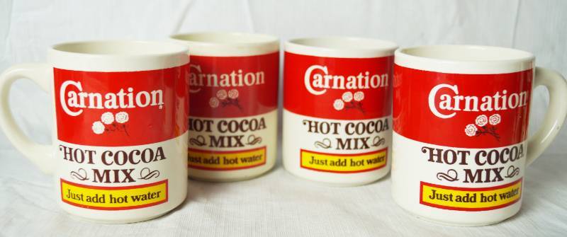 lot 1381 image: Lot of 4 Vintage Carnation Hot Cocoa Mix Mugs
