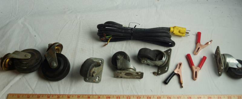lot 1677 image: Garage Lot of Casters, Battery Clips and Cord