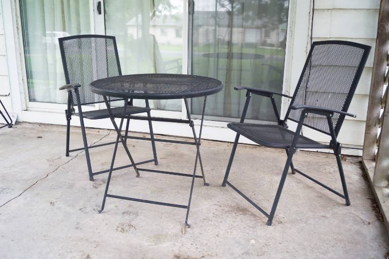 lot 1023 image: Very Neat Outdoor Folding Black Iron Table and Two Chairs - Sweet