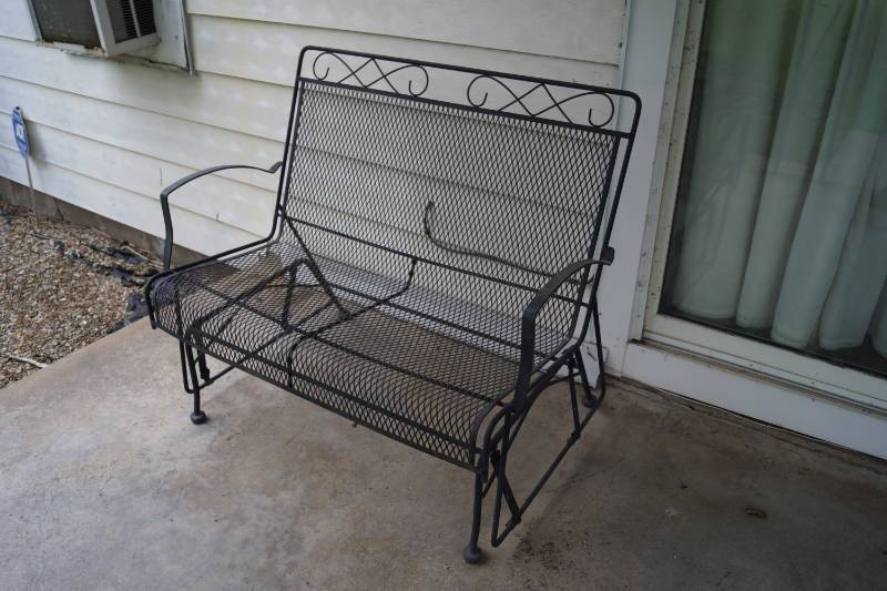 lot 1024 image: Black Iron Outdoor Glider - Comfy and Smooth Gliding