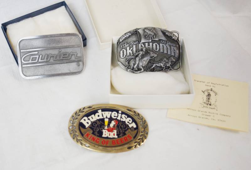 lot 1844 image: Lot of 3 Vintage Belt Buckles - Nice BUDWEISER (Brass), & Arroyo Grande Buckle Co. COURIER