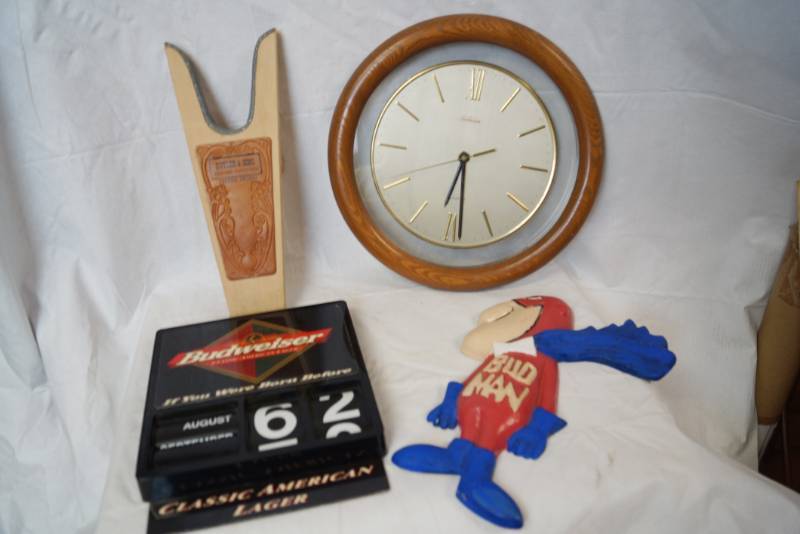 lot 1854 image: Lot of Misc. Items - BUDWEISER BUD MAN & Perpetual Calendar - Wall Clock and Hangings, Boot Remover
